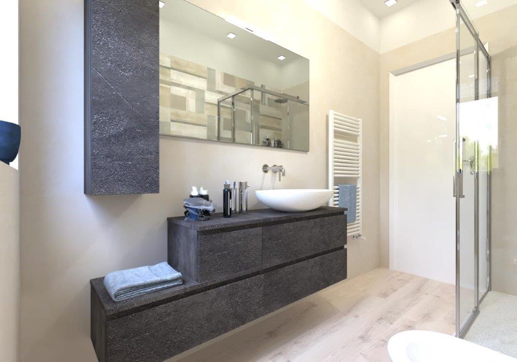 Bagno finito con doccia, lavabo e termoarredo